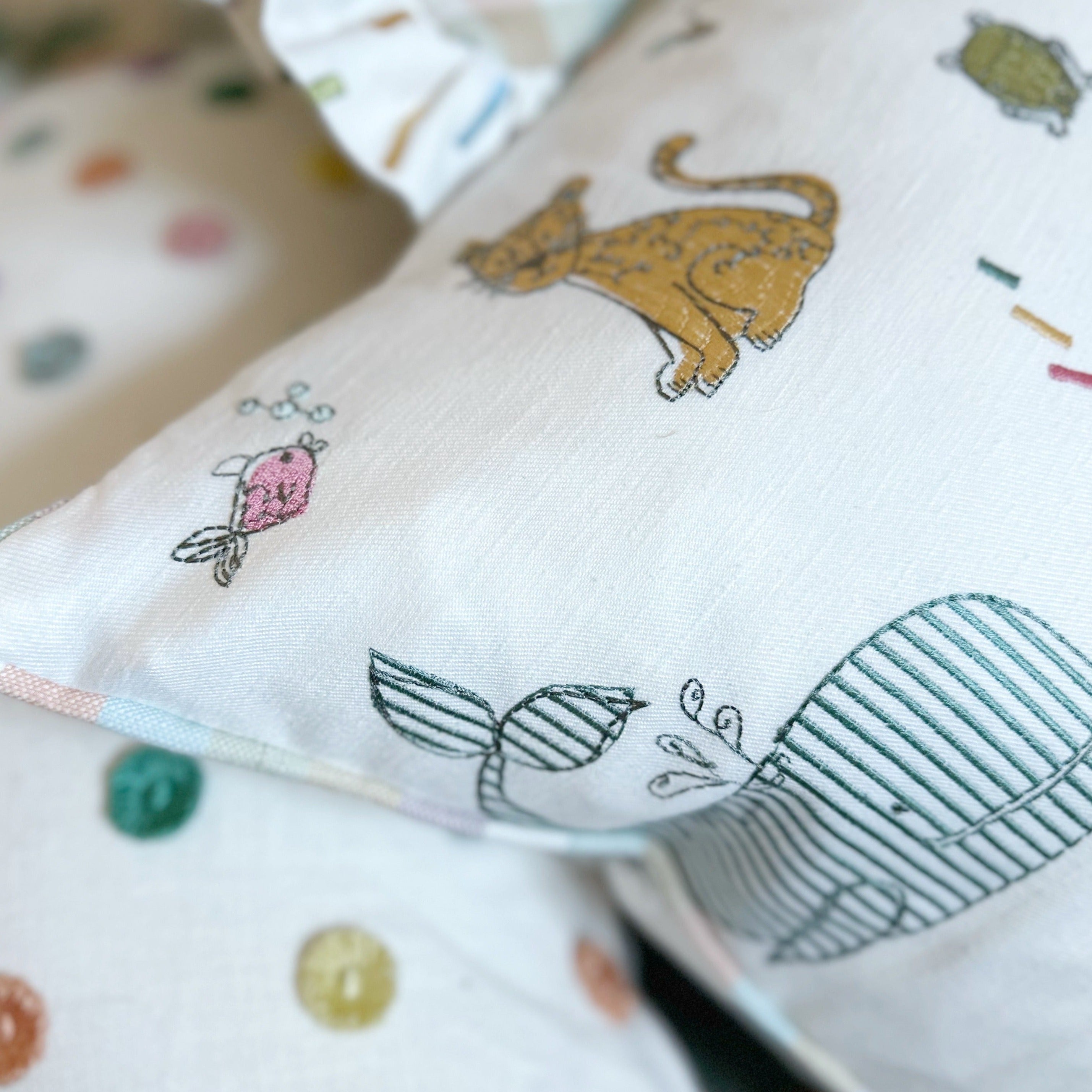 Embroidered animal piped cushion cover