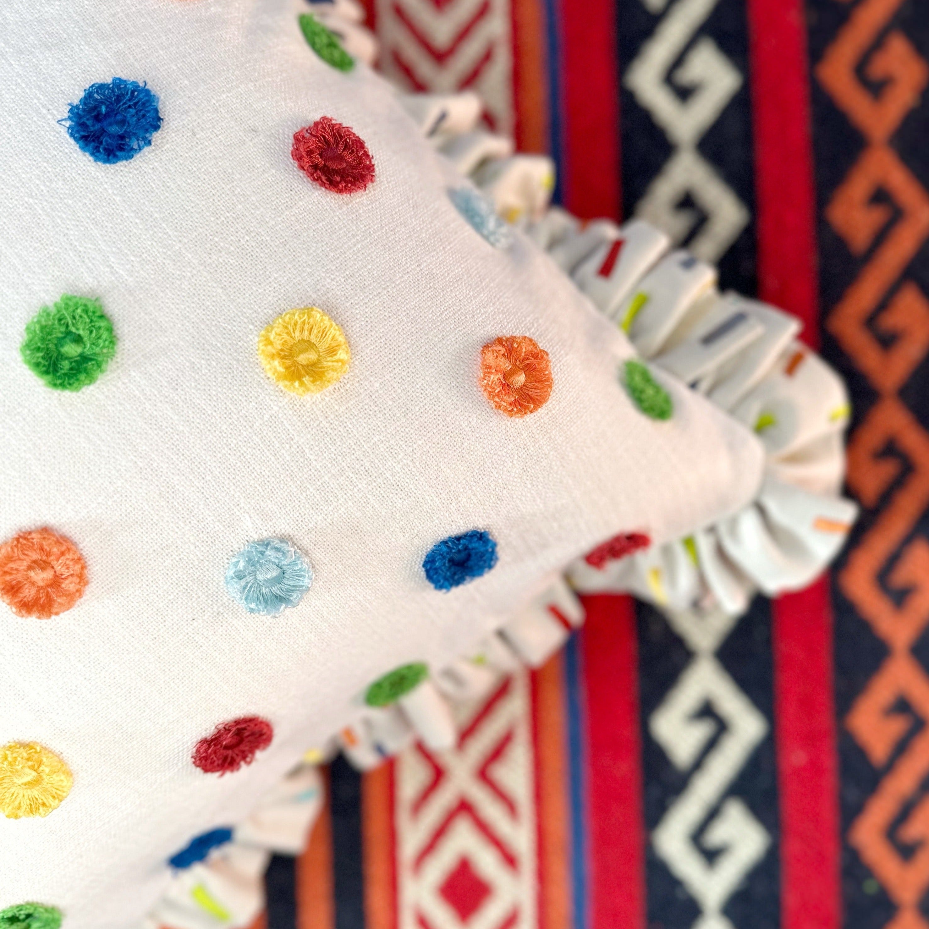 Multi pom cushion cover with ruffle