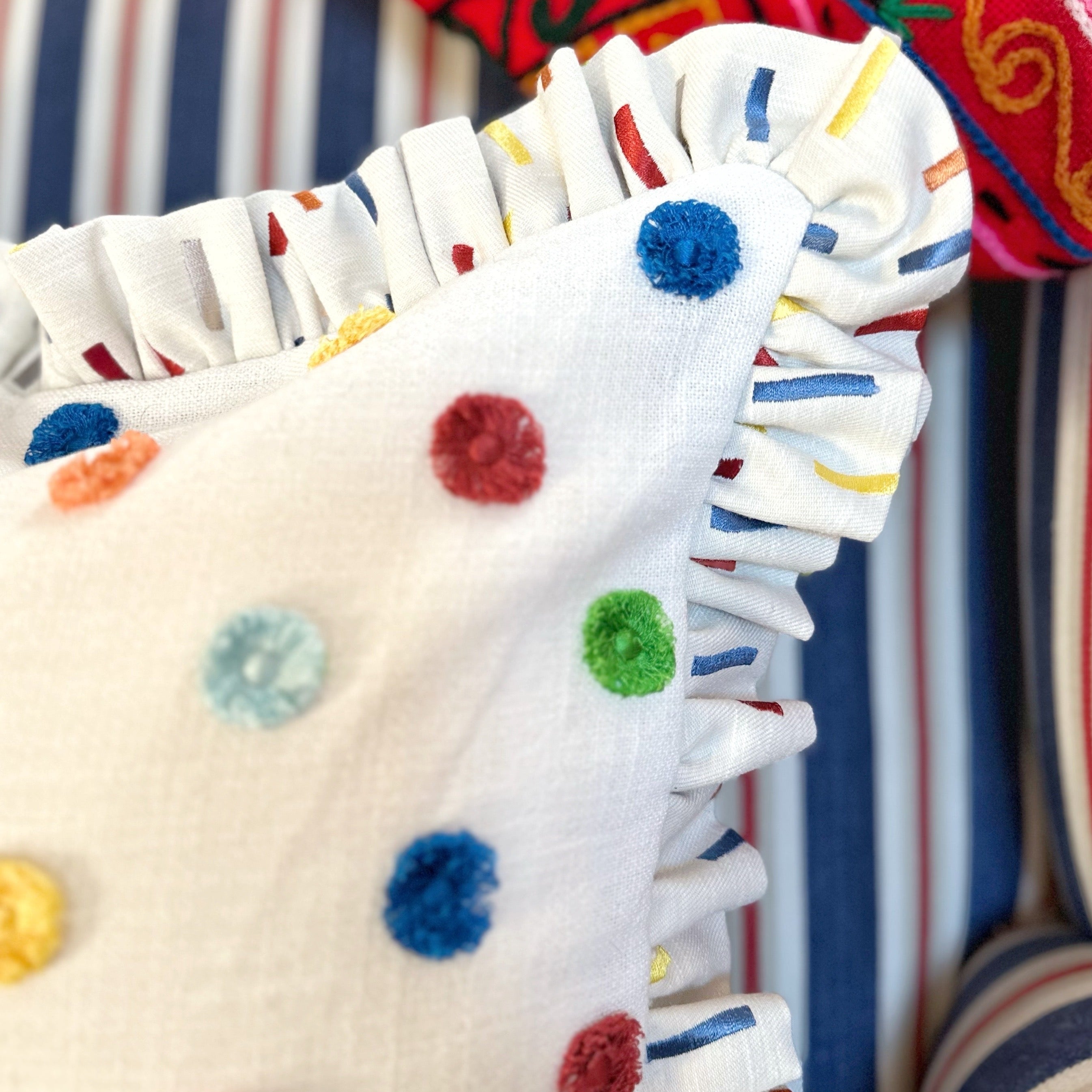 Multi pom cushion cover with ruffle