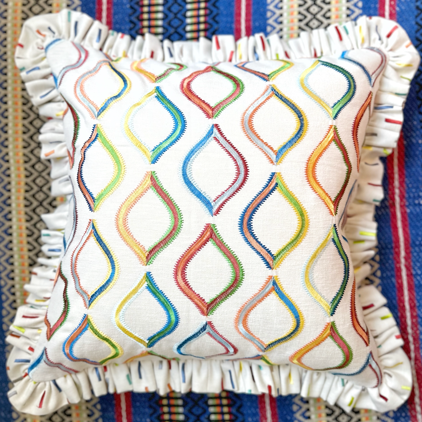 Multi embroidered cushion cover with ruffle
