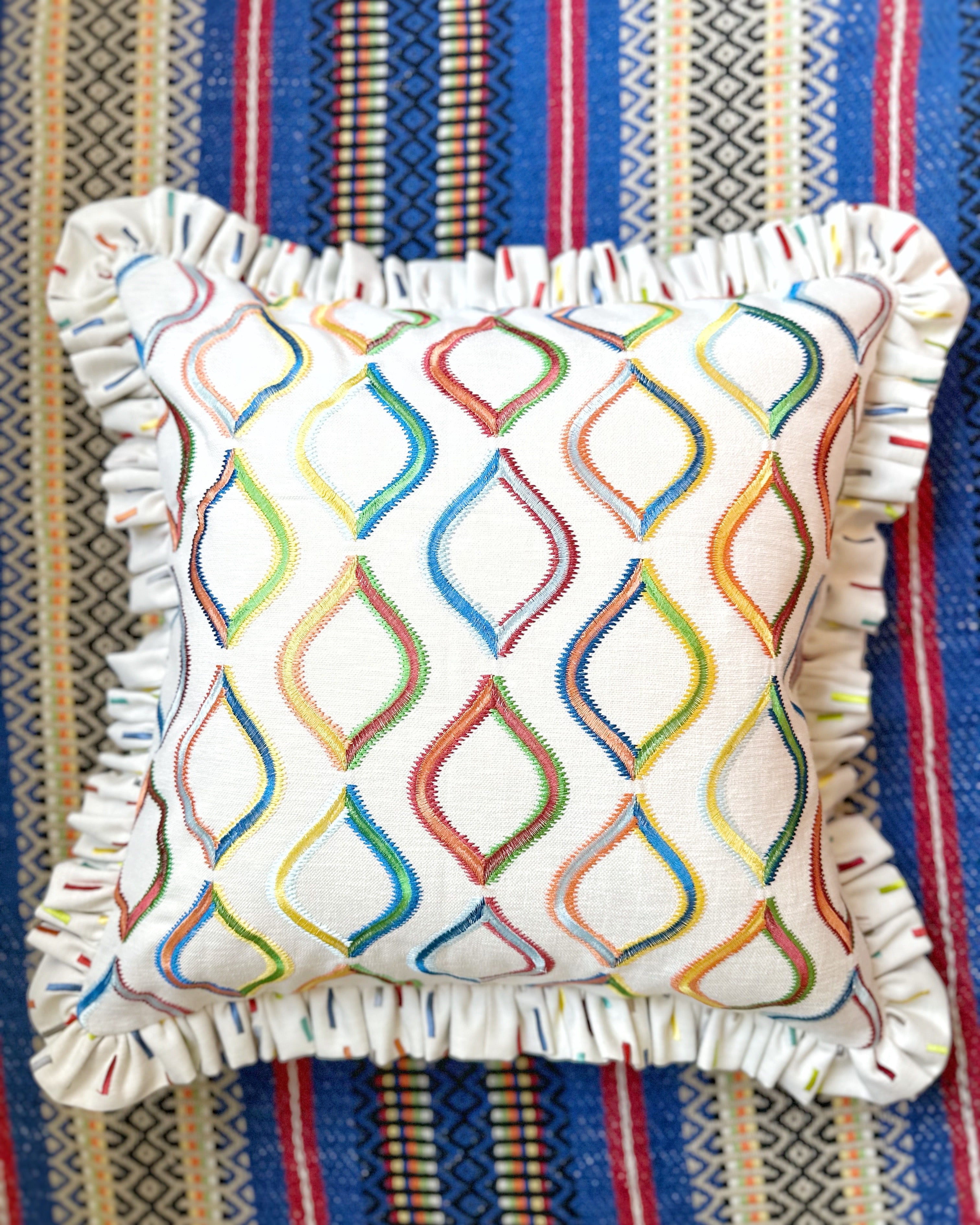 Multi embroidered cushion cover with ruffle